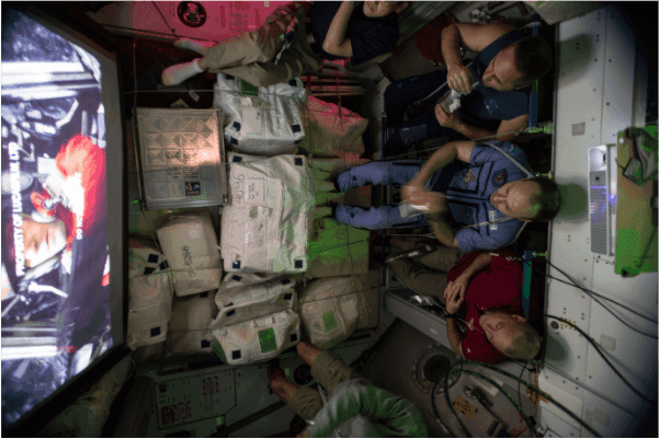 A crew watching a film aboard the ISS
