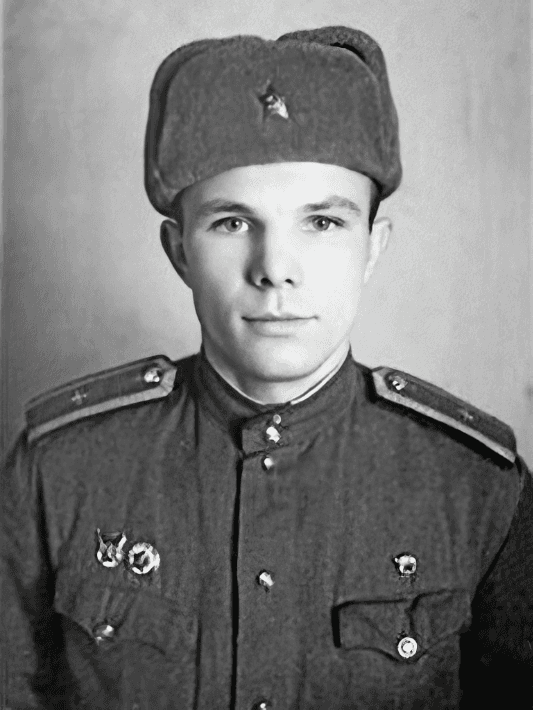 Yuri Gagarin in military uniform and a fur hat