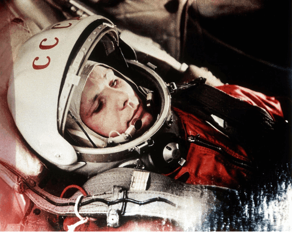 Yuri Gagarin in a spacesuit with USSR written on the helmet