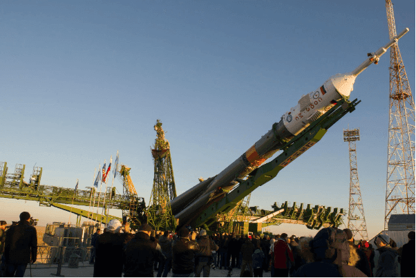 Soyuz rocket being raised to vertical at the launch complex