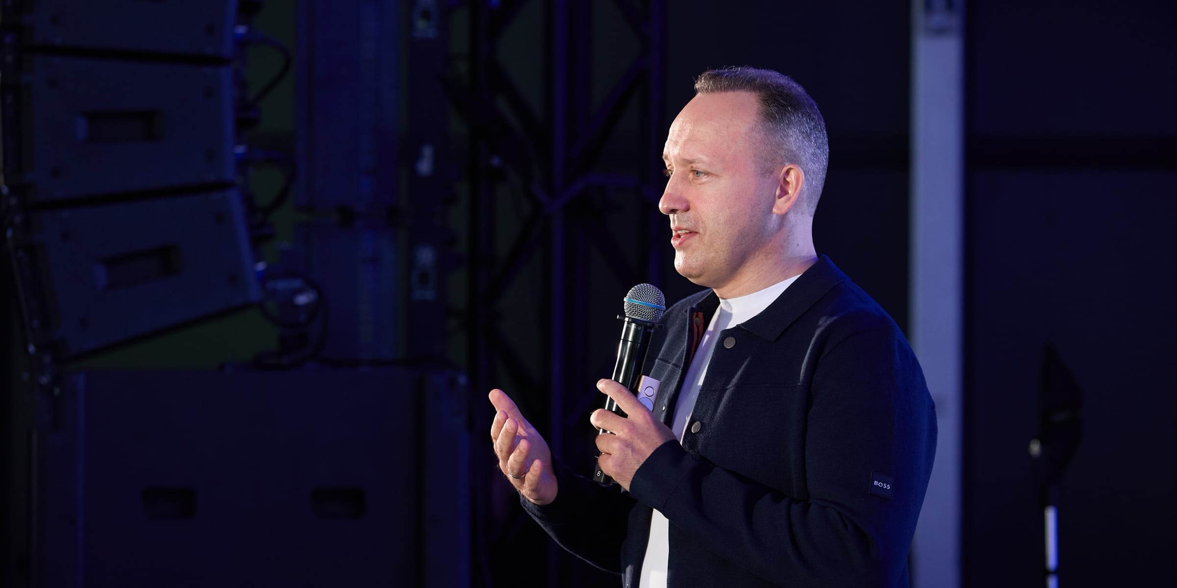 Cosmonaut Alexander Misurkin on stage during a talk