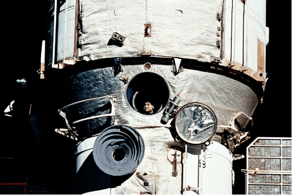 Cosmonaut Valery Polyakov in a window of the Mir station