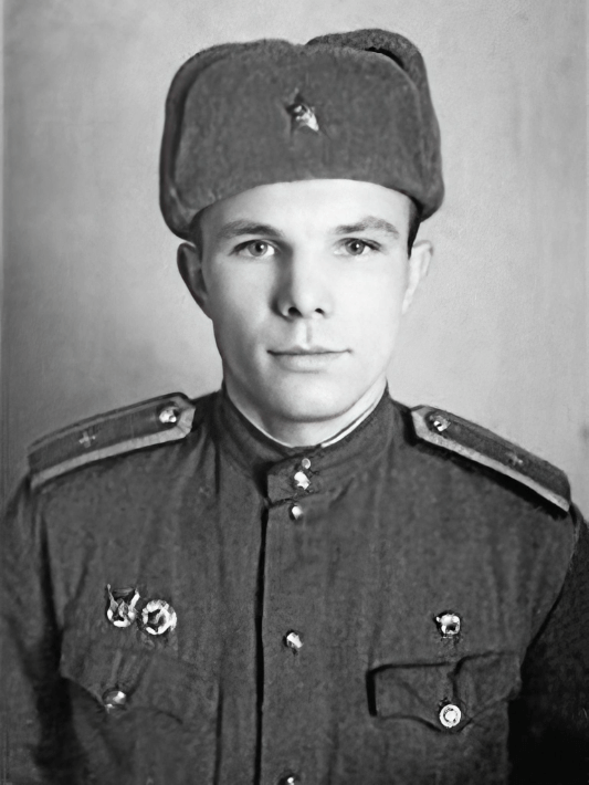 Yuri Gagarin in military uniform and a fur hat